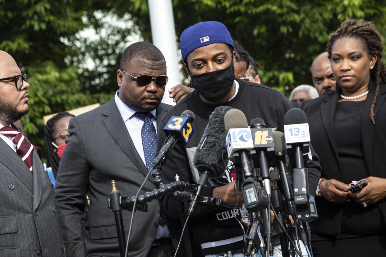 Andrew Brown Jr.'s son Jha'Rod Ferebee speaks during during a press conference outside the Pasqoutank County Public Safety building in Elizabeth City, N.C. on Tuesday. 