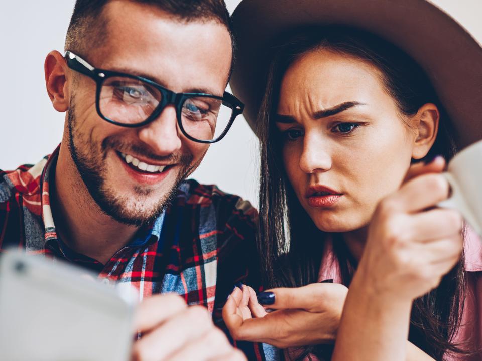 couple looking at phone