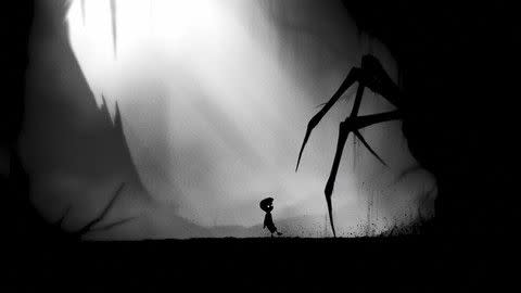 monochrome game limbo, with a child silhouette being attacked by a spider silhouette