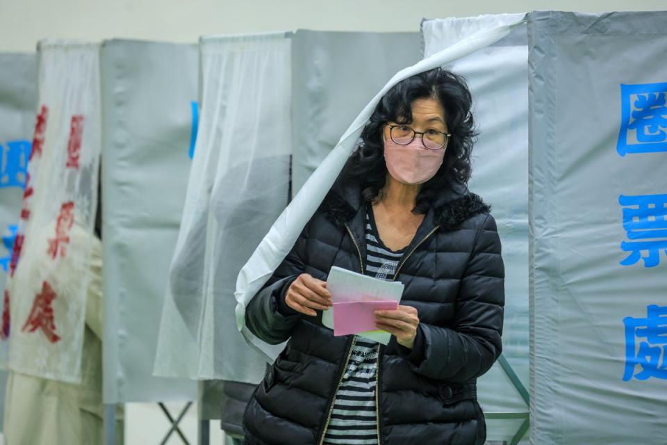 Voters cast their ballots in the presidential election on 13 January 2024 in Tai, Taiwan (Getty Images)