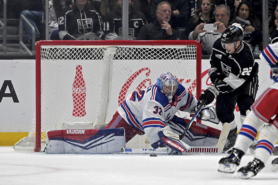 Los Angeles Kings left wing Kevin Fiala (22) scores past New York Rangers goaltender Jonathan Quick during the first period of an NHL hockey game Saturday, Jan. 20, 2024, in Los Angeles. (AP Photo/Jayne-Kamin-Oncea)