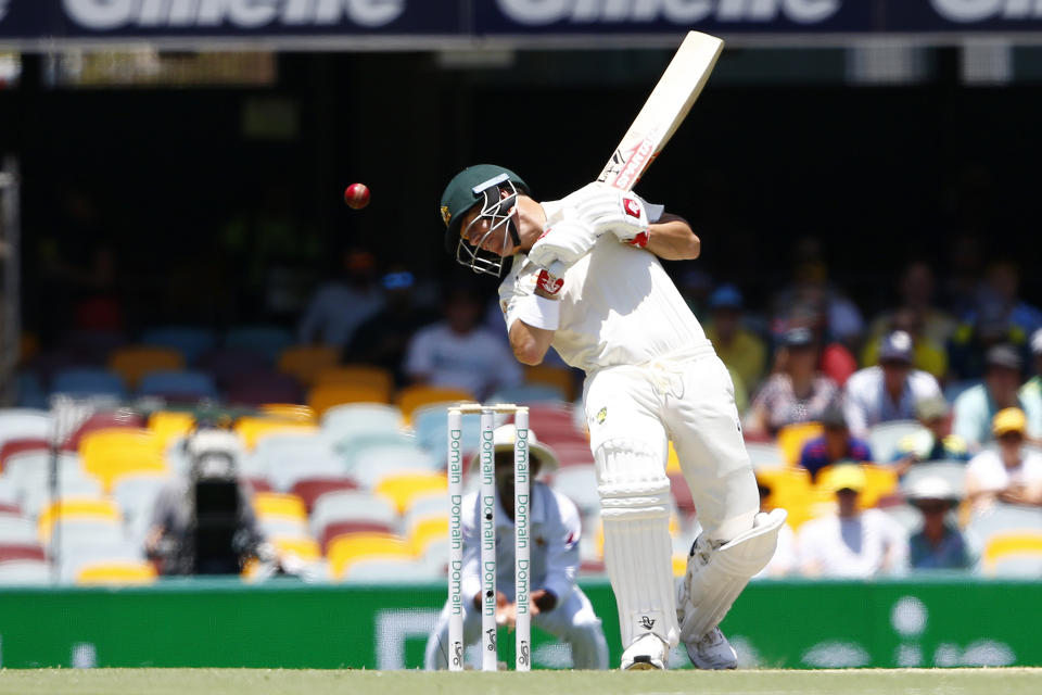 Australia's David Warner plays a shot to be caught behind during their cricket test match against Pakistan in Brisbane, Australia, Saturday, Nov. 23, 2019. (AP Photo/Tertius Pickard)