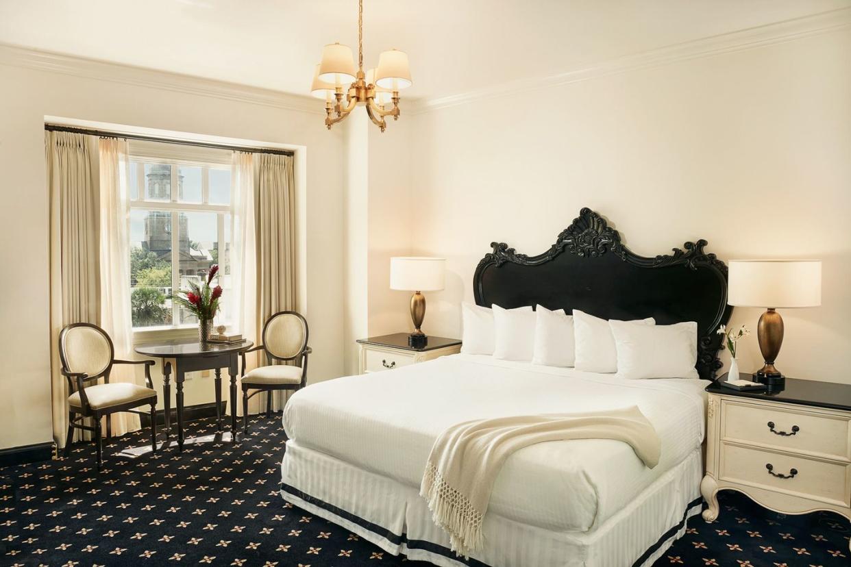 charleston hotel with victorian style black headboards in rooms