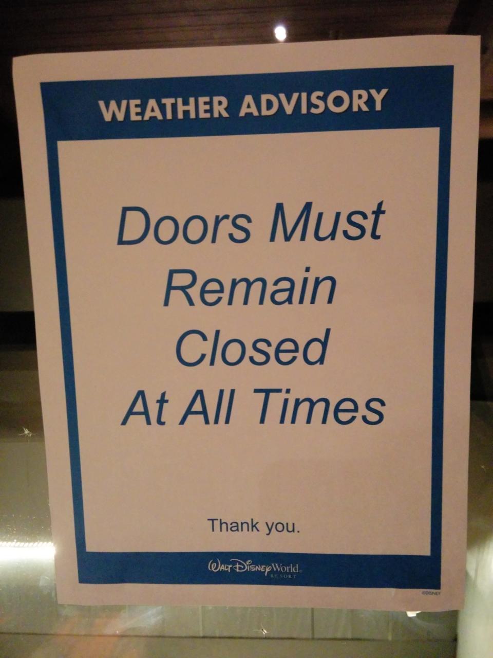 Signs advised Disney resort guests to keep doors closed.