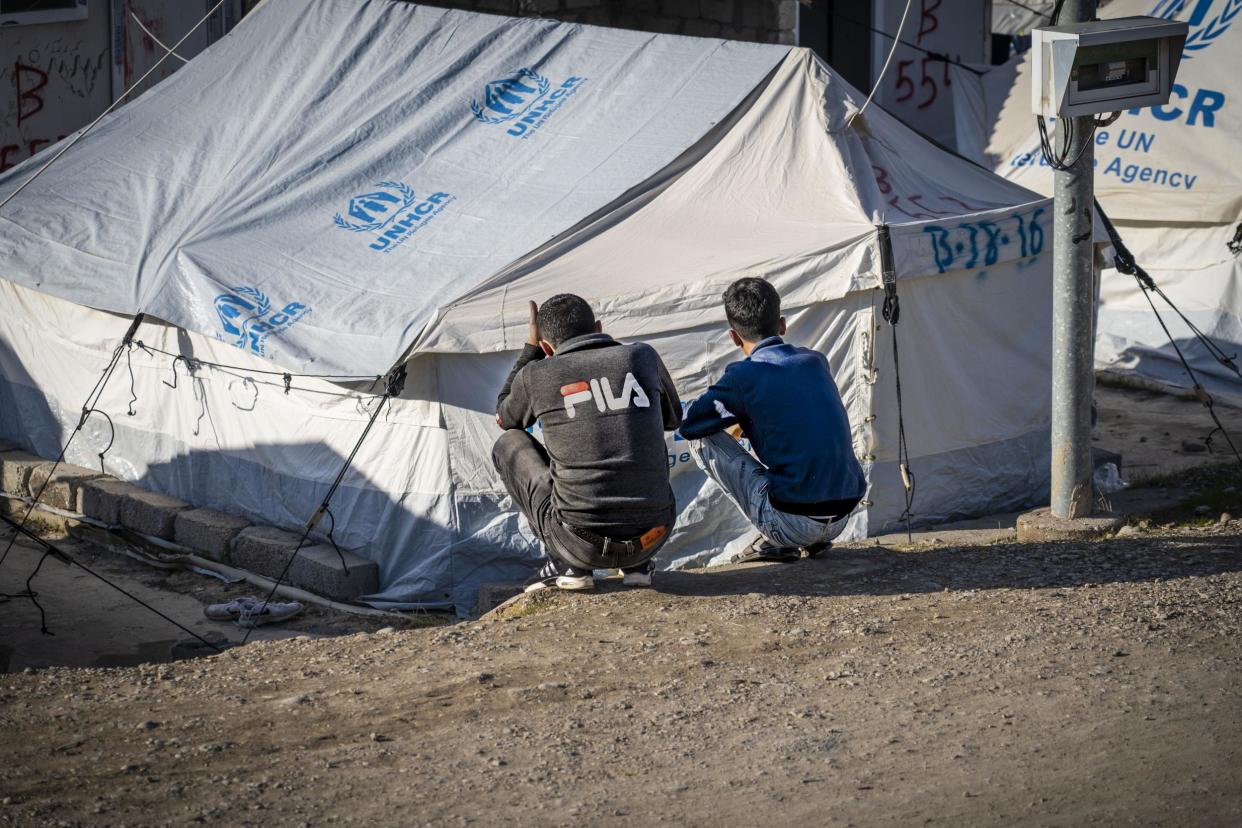 Young refugee men say they fled Northern Syria fearing conscription they now live in a refugee camp in Iraqi Kurdistan: Bel Trew