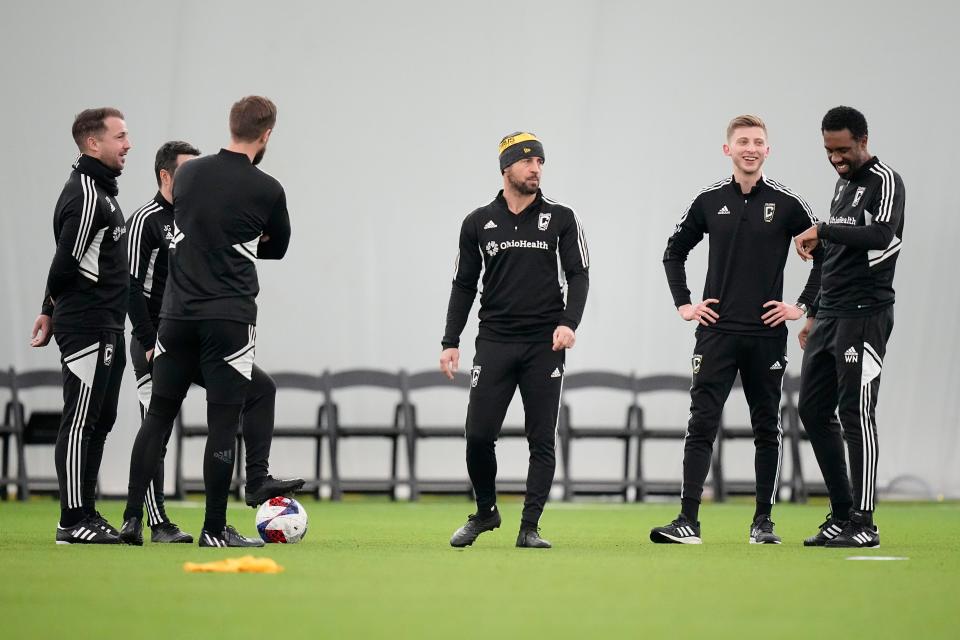 Crew head coach Wilfried Nancy, right, stands with his coaching staff and Crew 2 head coach Laurent Courtois, middle, during training at the OhioHealth Performance Center.