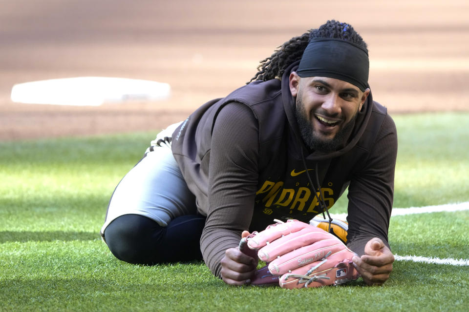 San Diego Padres' Fernando Tatis Jr. stretches before the team's baseball game against the Arizona Diamondbacks, Thursday, April 20, 2023, in Phoenix. (AP Photo/Rick Scuteri)