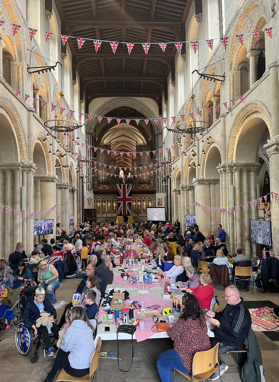Members of the public attend a tea party in Rochester Cathedral (Matilda Head/PA)