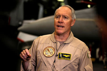 Commander, Carrier Strike Group TWO Rear Admiral Kenneth Whitesell, speaks to media on board the U.S. aircraft carrier, USS George H. W. Bush after transiting the Strait of Hormuz in this photo taken on March 21, 2017. REUTERS/Hamad I Mohammed