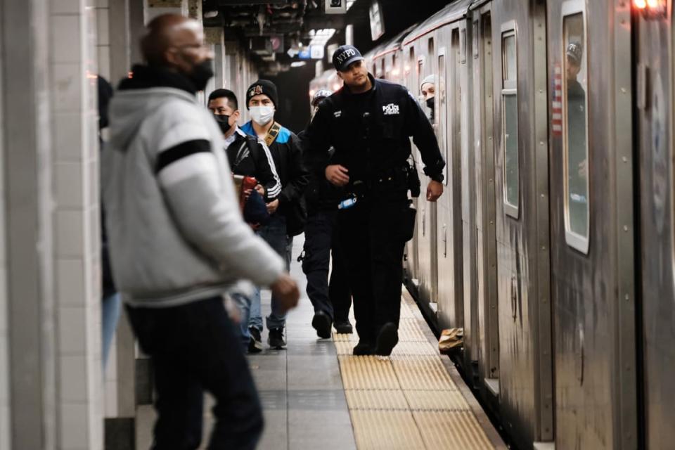 <div class="inline-image__caption"><p>Police search for a suspect in a Times Square subway station following a call to police from riders on April 25, 2022, in New York City. </p></div> <div class="inline-image__credit">Spencer Platt/Getty</div>