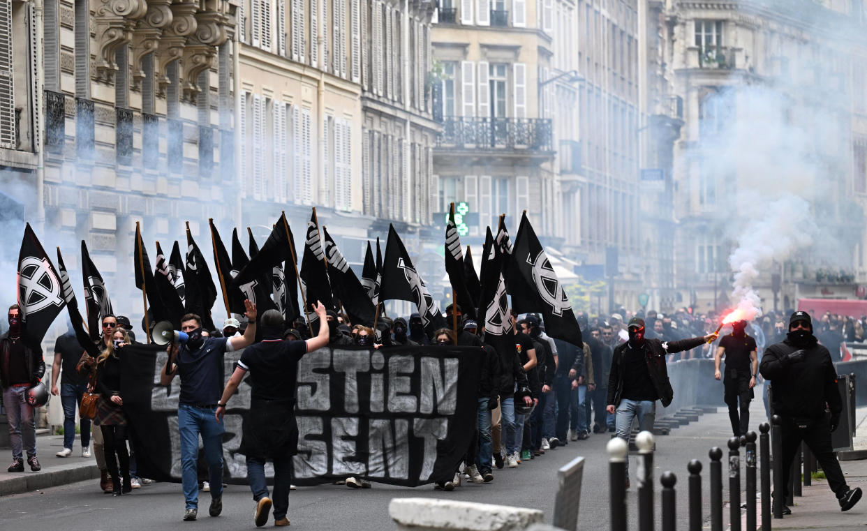 Members of far-right group "Comite du 9 Mai" (committee of May 9) gather to commemorate the 29th anniversary of the death of Sebastien Deyzieu of the "Oeuvre Francaise" ultranationist group, during a rally in Paris, on May 6, 2023. Deyzieu died after suffering a fall while being pursued by police following a far-right demonstration in Paris in 1994. (Photo by Emmanuel DUNAND / AFP)