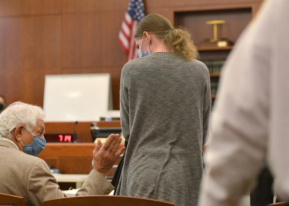 Julia Enright stands ahead of the verdict with her attorney Louis Badwey on Monday in Worcester Superior Court, where a jury found her guilty of second-degree murder.