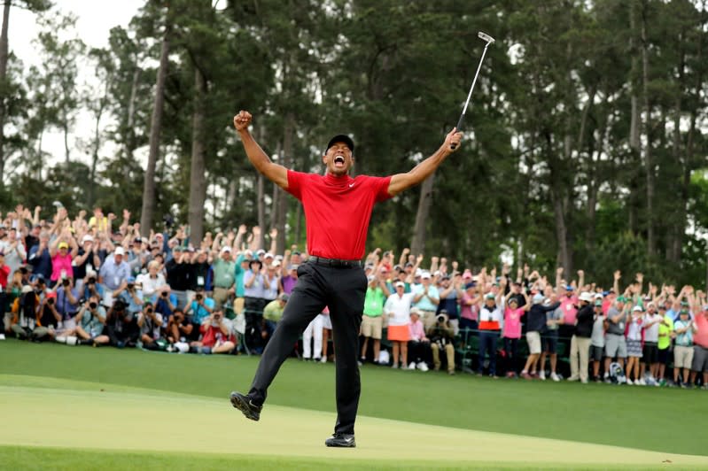 FILE PHOTO: Tiger woods celebrates after winning the 2019 Masters