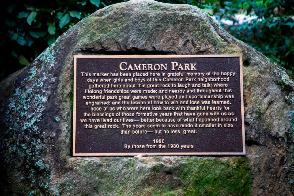 A plaque is affixed to a rock in the Cameron Park neighborhood in Raleigh Wednesday, Sept. 22, 2021. Developed in the early 1910s to attract upper-middle-class residents, Cameron Park is one of the Raleigh’s most prominent neighborhoods. Residents have until Thursday, Sept. 23, 2021 to cast their vote on whether to change its name referencing the family that once was one of the largest holders of enslaved people in North Carolina.