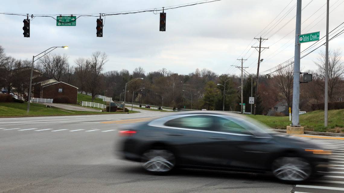 Traffic moves at the intersection of Tates Creek and Armstrong Mill despite the traffic light having no power Saturday, March 4, 2023 after a strong wind storm knocked out power to much of Lexington the night before.