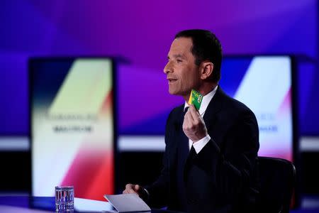 Benoit Hamon, Socialist party candidate for the 2017 French presidential election, attends the France 2 television special prime time political show, "15min to Convince" in Saint-Cloud, near Paris, France, April 20, 2017. REUTERS/Martin Bureau/Pool
