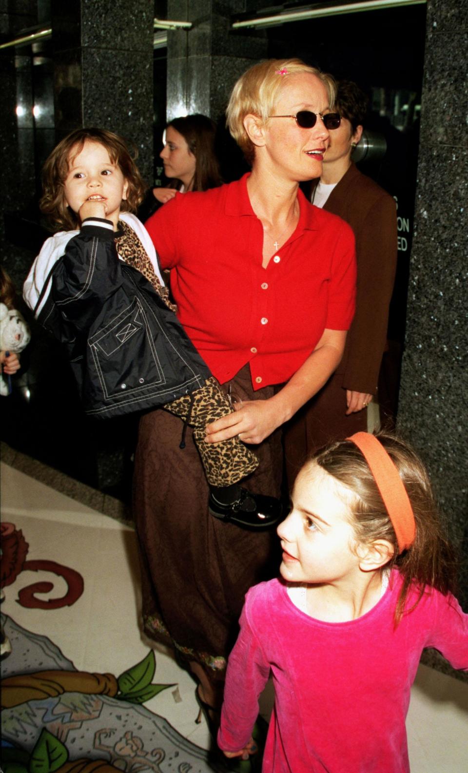 Tragically, Michael was found dead in a Sydney hotel room in 1997. Here Tiger is pictured with her mum and half sister Pixie Geldof in 1999.