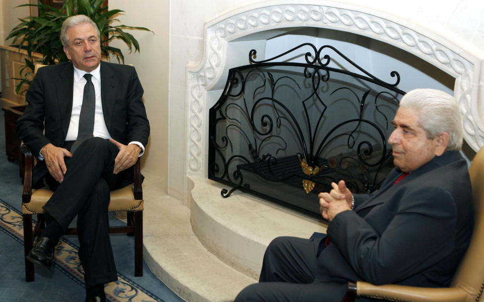 Cypriot President Demetris Christofias, right, meets with Greek Foreign Minister Dimitris Avramopoulos at the Presidential Palace, in Nicosia, Cyprus, Monday July 2, 2012. Avramopoulos is in Cyprus on a two-day official visit. (AP Photo/Philippos Christou)
