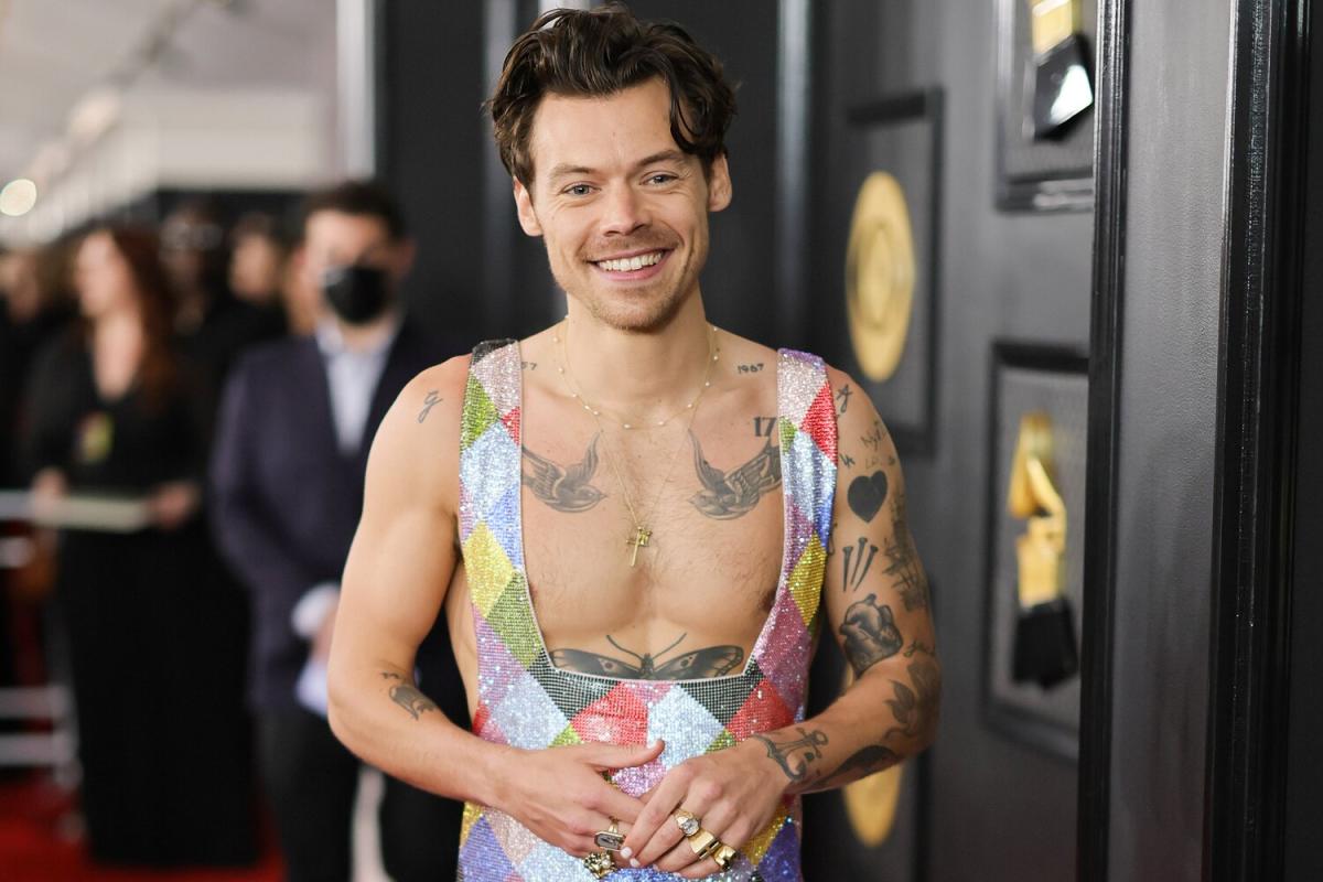 Harry Styles Is in a Rainbow Paradise Wearing a Sparkly Jumpsuit — and