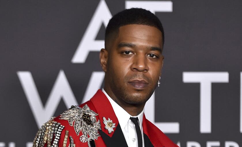 Kid Cudi arrives at the Celine Fall/Winter 2023 Fashion Show on Thursday, Dec. 8, 2022, at The Wiltern in Los Angeles. (Photo by Jordan Strauss/Invision/AP)