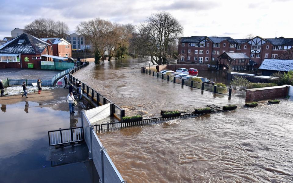 Dane Bridge in Northwich, Cheshire is overwhelmed by floodwater - Nick Jones / SWNS 