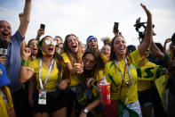 <p>Brazil fans enjoy the pre match atmosphere during the 2018 FIFA World Cup Russia Round of 16 match between Brazil and Mexico at Samara Arena on July 2, 2018 in Samara, Russia. (Photo by Matthias Hangst/Getty Images) </p>