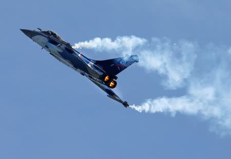 FILE PHOTO - French fighter jet Rafale made by Dassault performs during the Breitling Airshow in Sion, Switzerland September 15, 2017. REUTERS/Denis Balibouse