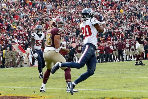 Houston Texans strong safety Justin Reid (20) intercepts a pass in the end zone intended for Washington Redskins tight end Jordan Reed (86) prior to returning the interception for a touchdown in the second quarter at FedEx Field - Credit: Geoff Burke/USA TODAY