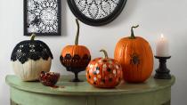 <p>Jack-o'-lanterns are the best part of <a href="https://www.womansday.com/home/decorating/g1279/easy-halloween-decorations/" rel="nofollow noopener" target="_blank" data-ylk="slk:Halloween decorating;elm:context_link;itc:0;sec:content-canvas" class="link ">Halloween decorating</a>, but if your carving skills are subpar, you're worried about your kids handling sharp tools, or you simply don't have the time to deal with scooping out pumpkin guts, you can still create a winning pumpkin for Halloween. All you need is an uncarved pumpkin, little inspiration, and a bucket full of craft supplies.</p><p>From <a href="https://www.womansday.com/home/decorating/g1902/painted-pumpkins-ideas/" rel="nofollow noopener" target="_blank" data-ylk="slk:painted pumpkins;elm:context_link;itc:0;sec:content-canvas" class="link ">painted pumpkins</a> that would fit right in at a modern Halloween wedding, to funny pumpkin faces that kids will love creating, adults and children alike will love these easy, no-carve pumpkin decorating ideas. So, what can you use to decorate a pumpkin? The sky's the limit: pom poms, paint, glitter, fake spiders, cobwebs, twinkle lights, rickrack — there's pretty much nothing you can't use to decorate your gourds this fall. Ahead you'll find all kinds of ideas for decorating big and mini pumpkins, whether you're up for some light carving work or just want to keep it simple with a few well-placed stickers. Up for more <a href="https://www.womansday.com/home/crafts-projects/g2488/simple-halloween-crafts/" rel="nofollow noopener" target="_blank" data-ylk="slk:Halloween craft ideas;elm:context_link;itc:0;sec:content-canvas" class="link ">Halloween craft ideas</a>? Check out our favorite <a href="https://www.womansday.com/home/crafts-projects/g2490/halloween-kids-crafts/" rel="nofollow noopener" target="_blank" data-ylk="slk:Halloween crafts for kids;elm:context_link;itc:0;sec:content-canvas" class="link ">Halloween crafts for kids</a>, our free <a href="https://www.womansday.com/home/crafts-projects/how-to/g303/10-pumpkin-perfect-patterns-20702/" rel="nofollow noopener" target="_blank" data-ylk="slk:Halloween pumpkin stencils;elm:context_link;itc:0;sec:content-canvas" class="link ">Halloween pumpkin stencils</a>, and the best <a href="https://www.womansday.com/style/fashion/g490/60-clever-last-minute-costume-ideas/" rel="nofollow noopener" target="_blank" data-ylk="slk:DIY costume ideas;elm:context_link;itc:0;sec:content-canvas" class="link ">DIY costume ideas</a>. </p>