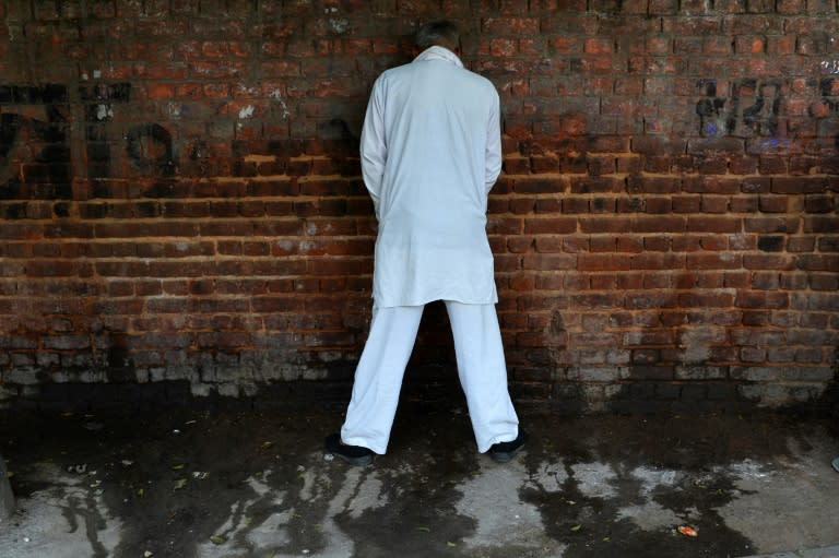 In order to motivate people to use the toilet, teams of Indian government employees and volunteers roam villages to publicly shame those who relieve themselves in the open