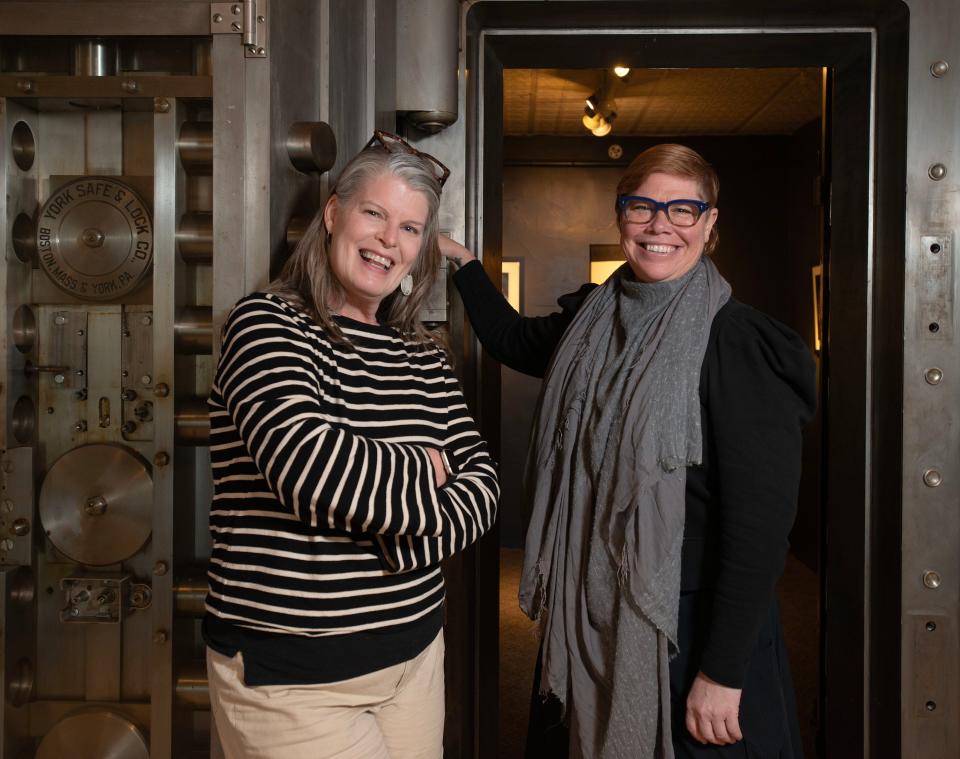 Christine Ernst, left, the new director of learning at the Cultural Center of Cape Cod in South Yarmouth, stands with executive director Molly Demeulenaere in the vault gallery of the Great Hall.