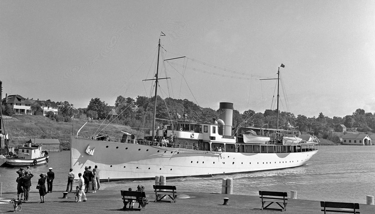 185-foot luxury yacht Mizpah leaving Round Lake, 1930s.