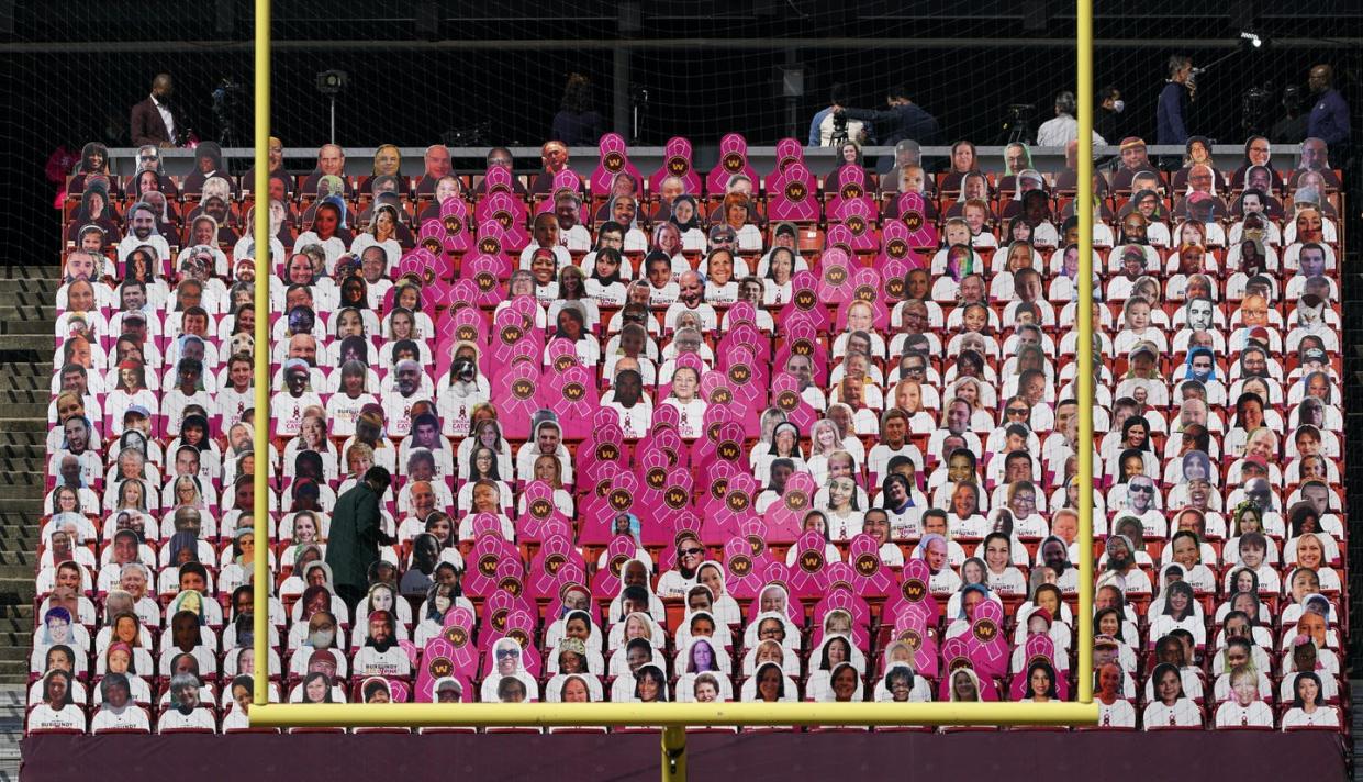 <span class="caption">A Breast Cancer Awareness sign is seen before an NFL football game between the Washington Football Team and the Baltimore Ravens on Oct. 4, 2020, in Landover, Md. </span> <span class="attribution"><span class="source">(AP Photo/Susan Walsh)</span></span>