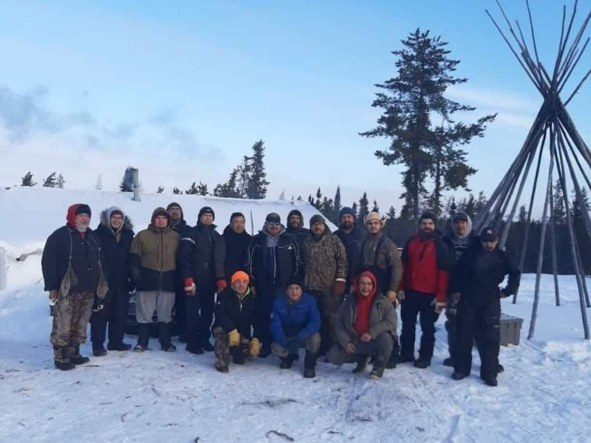 An Innu hunting party and their Cree hosts near Chisasibi in northern Que. A traditional harvest of 300 caribou happened from Feb. 6 to March 4, 2022. It was the first after the signing of a 'mutual understanding' between the two nations to protect the herd. (submitted by Linda Cox - image credit)