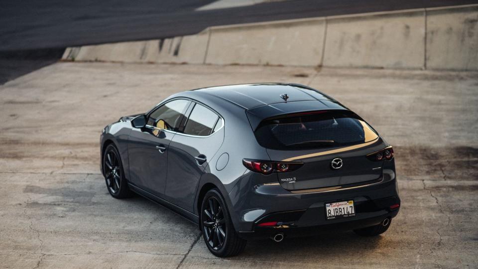 2025 mazda 3 hatchback rear three quarter shot