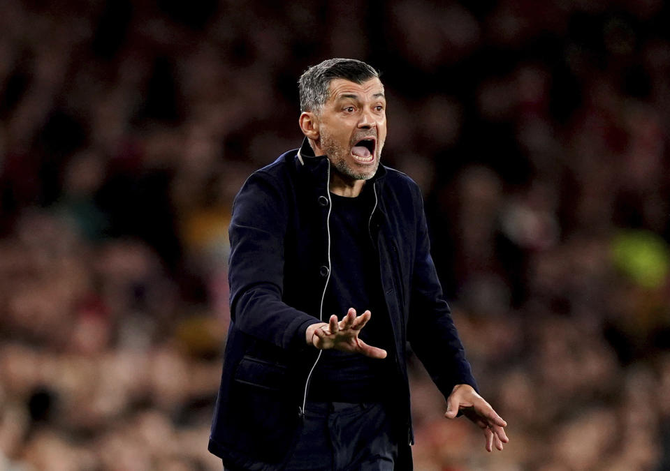 Porto manager Sergio Conceicao gestures on the touchline during the Champions League round of 16, second leg soccer match between Arsenal and Porto at the Emirates Stadium, London, Tuesday March 12, 2024. (Zac Goodwin/PA via AP)