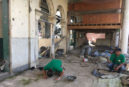 Sultan Nasrollah Conding prays inside the Bato Mosque in Marawi, Philippines January 13, 2018. REUTERS/Tom Allard