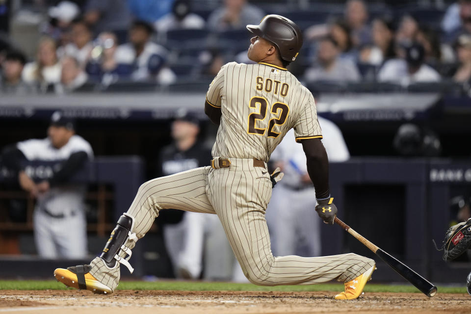 San Diego Padres' Juan Soto watches his two-run home run during the fifth inning of the team's baseball game against the New York Yankees on Friday, May 26, 2023, in New York. (AP Photo/Frank Franklin II)