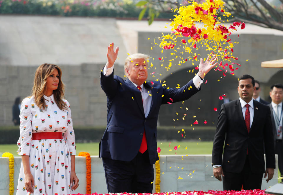 U.S. President Donald Trump and first lady Melania Trump attend a wreath laying ceremony at Mahatma Gandhi's memorial at Raj Ghat in New Delhi, India, February 25, 2020. REUTERS/Al Drago