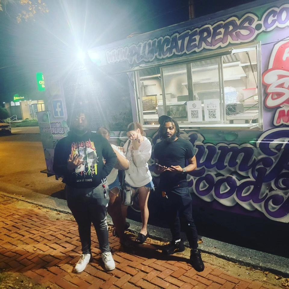 Plum Pit Food Truck customers in Wilmington on the night of Sept. 2 before a car drove into the mobile kitchen, injuring chef Kahlil Floyd.