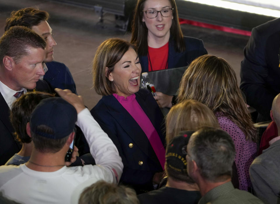 Iowa Gov. Kim Reynolds greets supporters after speaking with Republican presidential candidate Florida Gov. Ron DeSantis, Monday, Nov. 6, 2023, in Des Moines, Iowa. (AP Photo/Bryon Houlgrave)