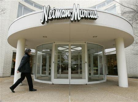 A shopper enters a Neiman Marcus store in Oak Brook, Illinois, a suburb of Chicago, in this May 2, 2005 file photo. REUTERS/John Gress/Files