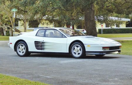 A white Ferrari Testarossa is seen in Miami, Florida, in this December 17, 2014, handout photo provided by Auto Pawn Plus. REUTERS/Auto Pawn Plus/Handout