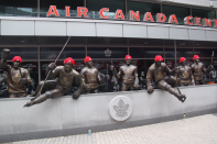 <p>Maple Leaf greats on Legends Row donned TFC hats for the occasion. Credit: Toronto FC Twitter </p>