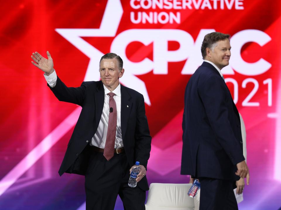 Rep. Paul Gosar, R-Ariz., right, and Christopher Landau, former ambassador to Mexico, arrive for a panel discussion on the Devaluing of American Citizenship during the Conservative Political Action Conference in the Hyatt Regency on Feb. 27 in Orlando, Fla. Begun in 1974, CPAC brings together conservative organizations, activists and world leaders to discuss issues important to them.