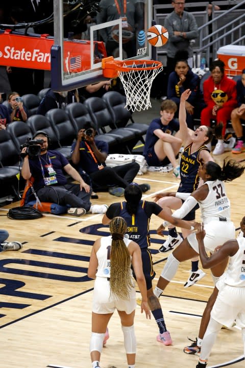 INDIANAPOLIS, IN – MAY 09: Indiana Fever guard Caitlin Clark (22) takes a shot against Atlanta Dream forward Cheyenne Parker-Tyus (32) during a WNBA preseason game on May 9, 2024, at Gainbridge Fieldhouse in Indianapolis, Indiana. (Photo by Brian Spurlock/Icon Sportswire via Getty Images)