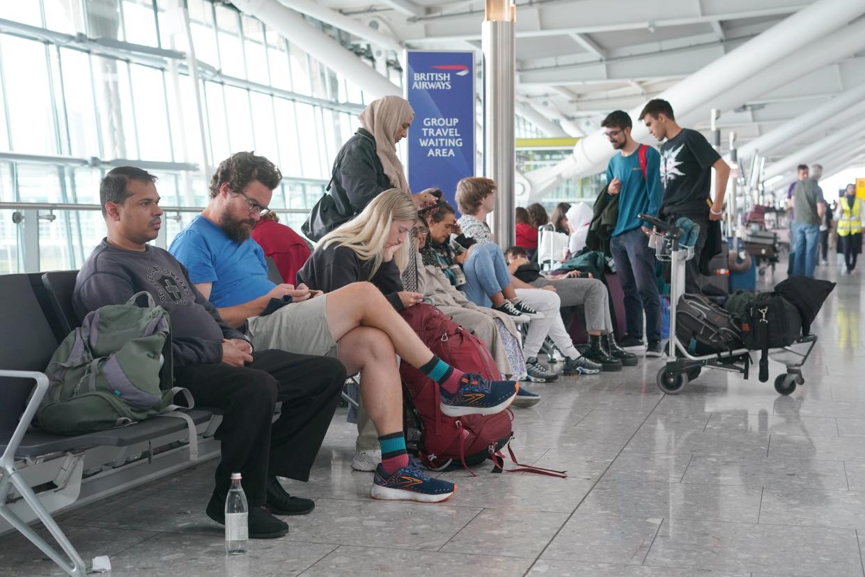 Passengers at Heathrow Airport as disruption from air traffic control issues continues across the UK and Ireland (PA)