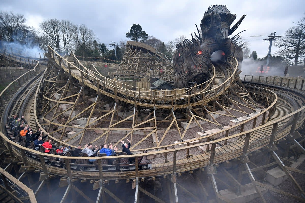 Chasing a thrill: Visitors at Alton Towers  (PA)