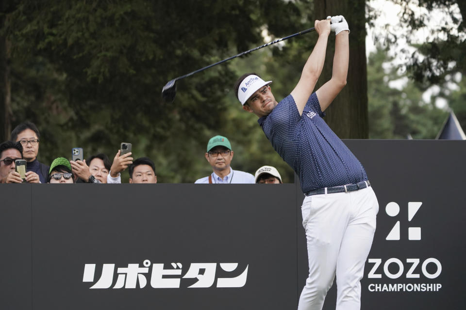 Beau Hossler of the United States hits his tee shot on the seventeenth hole in the third round of the PGA Tour Zozo Championship at the Narashino Country Club in Inzai on the outskirts of Tokyo, Saturday, Oct. 21, 2023. (AP Photo/Tomohiro Ohsumi)