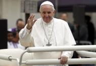 Pope Francis waves as he leaves after a Holy Mass in Carpi, Italy, April 2, 2017. REUTERS/Alessandro Garofalo